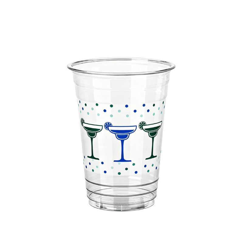 Clear plastic cup with illustrated margarita-style cocktail glasses and scattered blue and green confetti dots on a white background.