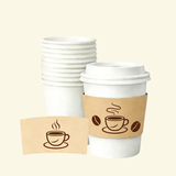 Stack of blank white paper cups with a lidded cup wrapped in a kraft sleeve with a steaming coffee cup icon and coffee beans; a matching flat sleeve sample is shown in front.