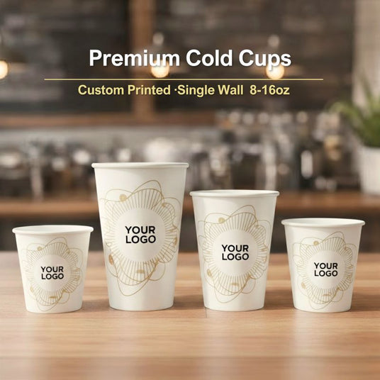 Banner reading “Premium Cold Cups”; four custom-printed single-wall cold cups (8–16oz) lined up on a wooden table.